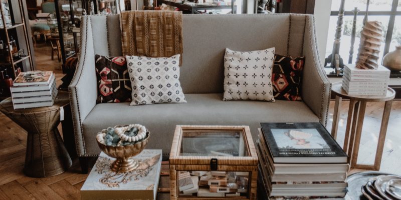 Interior of a room with books on the coffee table