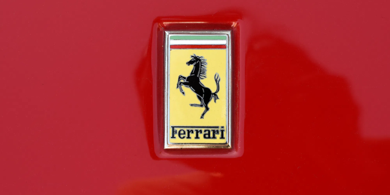 Ferrari logo on a red background